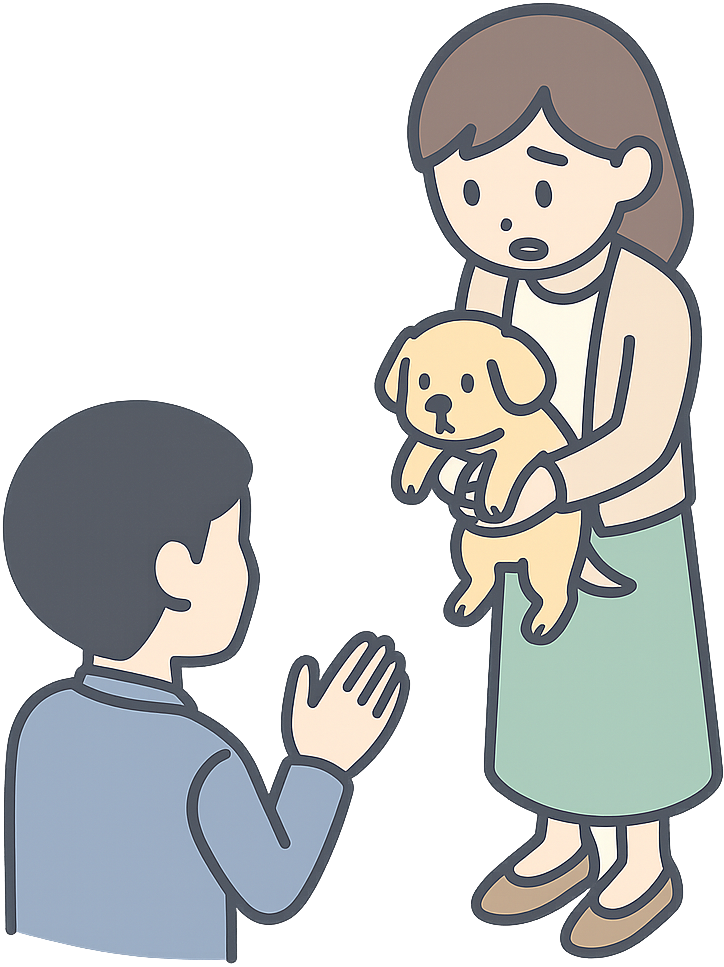 マンションの住人に謝っている飼い主の女性