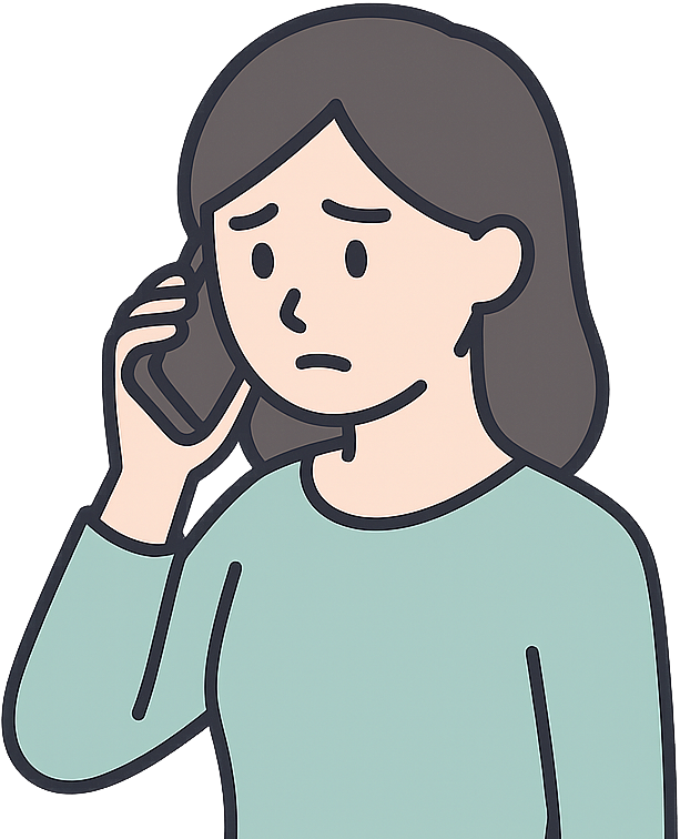 深刻な表情で電話をかけている女性